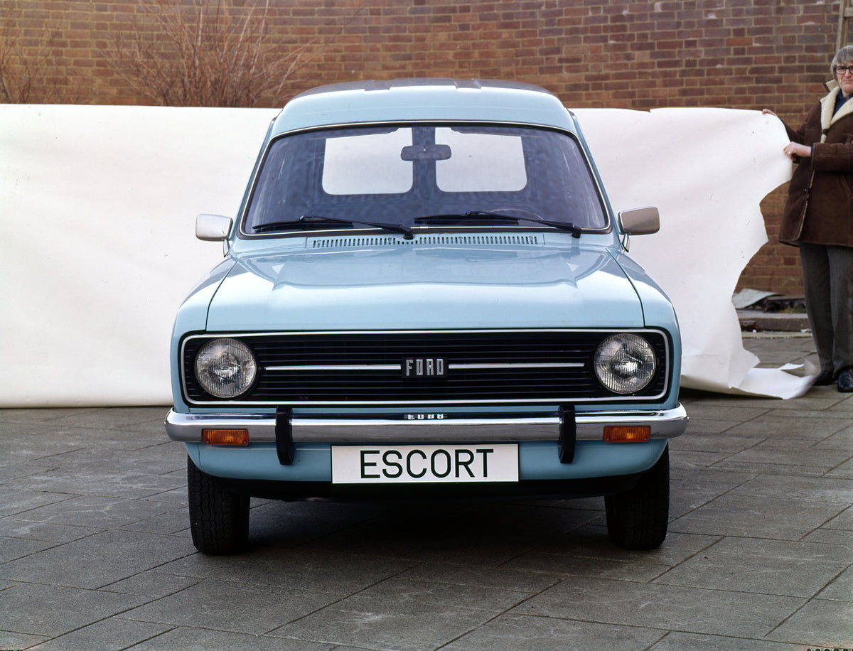 This archival image documents the 1975 Ford Escort Mark II Van front view with white background and is preserved in the Ford Heritage Vault as part of Ford Motor Company's historic photographic archive. Free for personal, non-commercial use. Ford ...