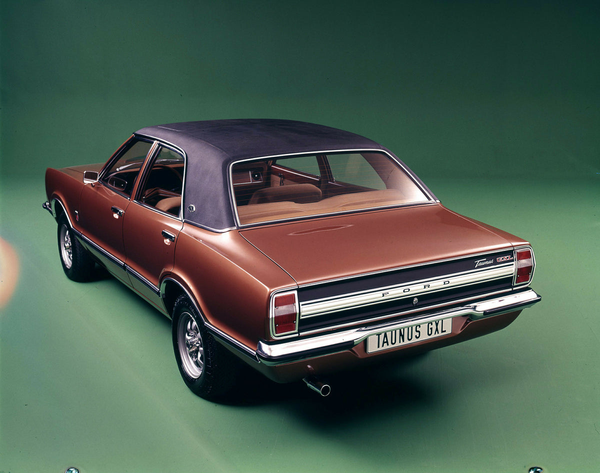 This archival image documents the 1973 Ford Taunus GXL rear view in studio and is preserved in the Ford Heritage Vault as part of Ford Motor Company's historic photographic archive. Free for personal, non-commercial use. Ford Heritage Vault refere...