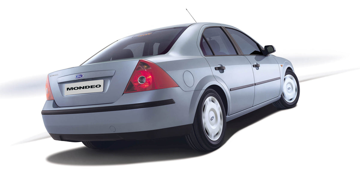 This archival image documents the 2003 Ford Mondeo rear view in studio MS96271 and is preserved in the Ford Heritage Vault as part of Ford Motor Company's historic photographic archive. Free for personal, non-commercial use. Ford Heritage Vault re...
