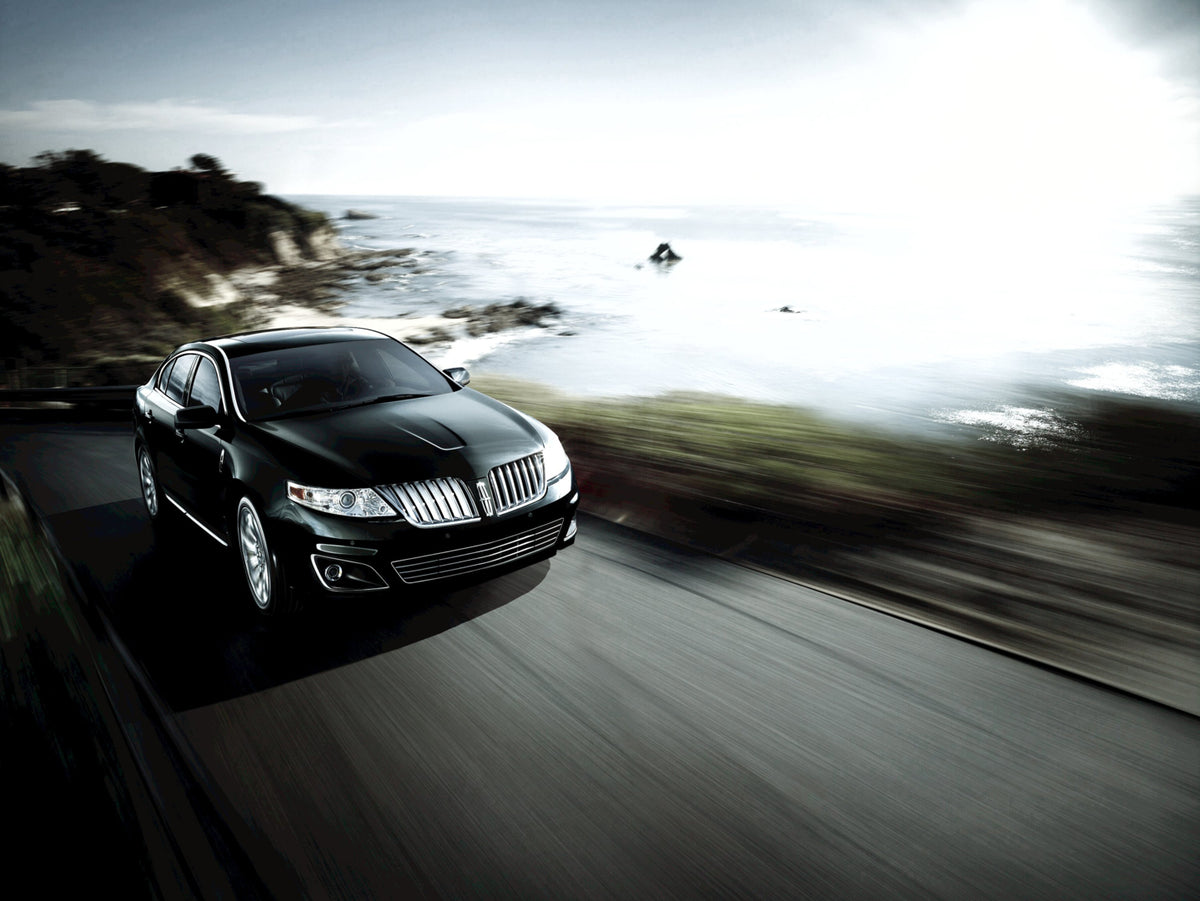 This archival image documents the 2010 Lincoln MKS action shot on scenic road MSE0585441A936599E and is preserved in the Ford Heritage Vault as part of Ford Motor Company's historic photographic archive. Free for personal, non-commercial use. Ford...