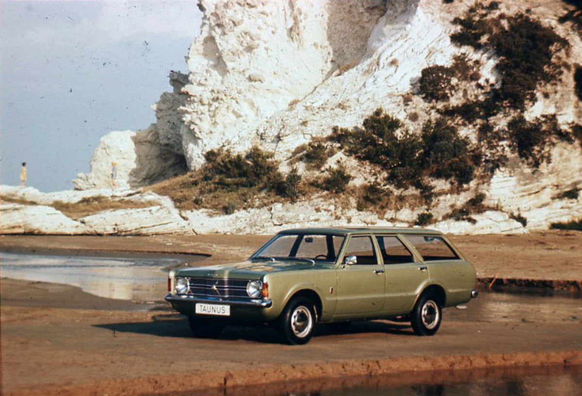 This archival image documents the 1970 Ford Taunus TC on scenic beach with rock formation in Italy and is preserved in the Ford Heritage Vault as part of Ford Motor Company's historic photographic archive. Free for personal, non-commercial use. Fo...