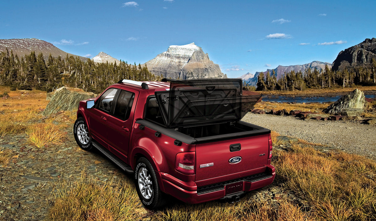 This archival image documents the 2009 Ford Explorer Sport Trac trunk timelapse on scenic road MS516679 and is preserved in the Ford Heritage Vault as part of Ford Motor Company's historic photographic archive. Free for personal, non-commercial us...
