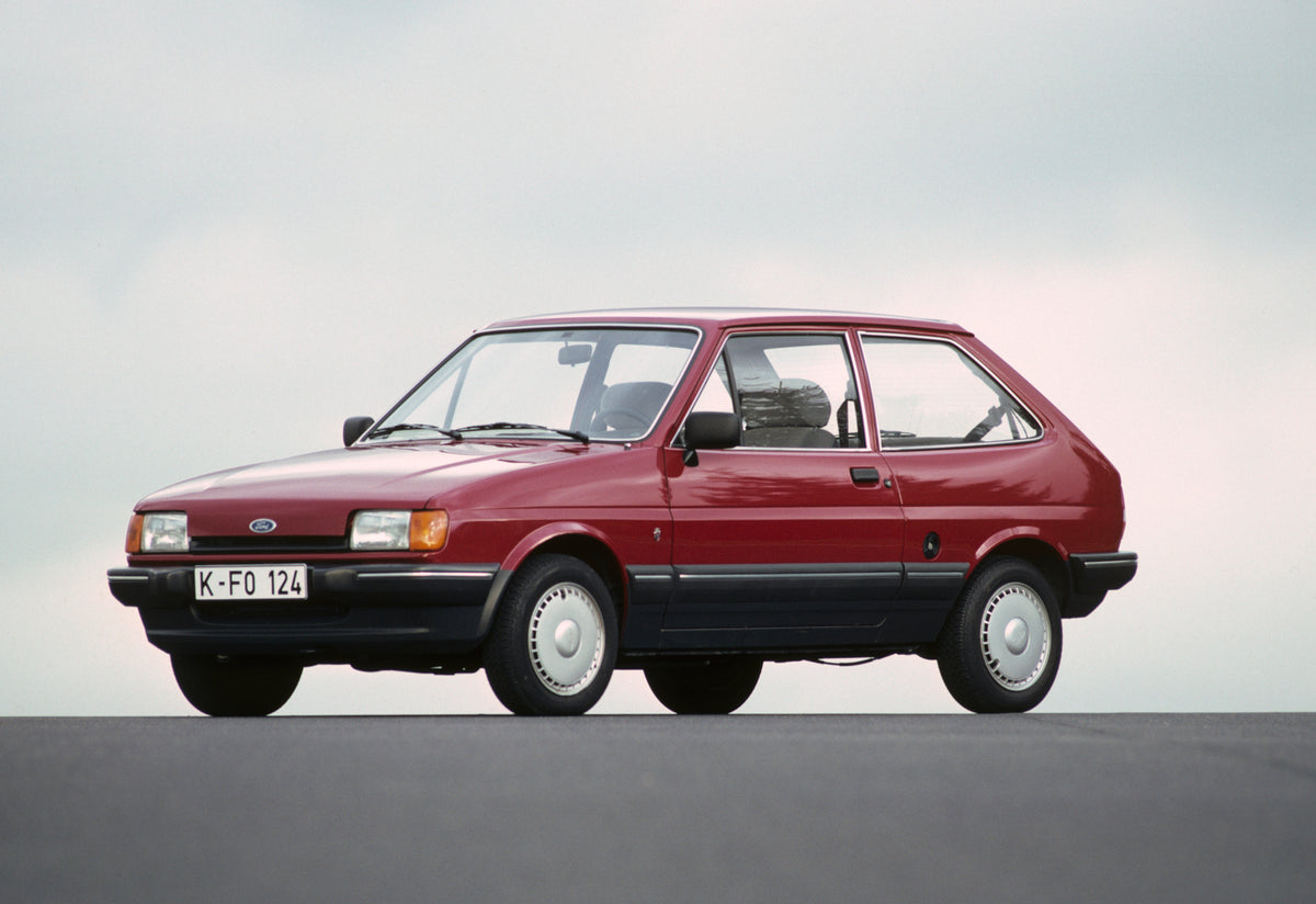 This archival image documents the 1987 Heritage Archive - 1983 Ford Fiesta Ghia Mark II with scenic blue sky and is preserved in the Ford Heritage Vault as part of Ford Motor Company's historic photographic archive. Free for personal, non-commerci...