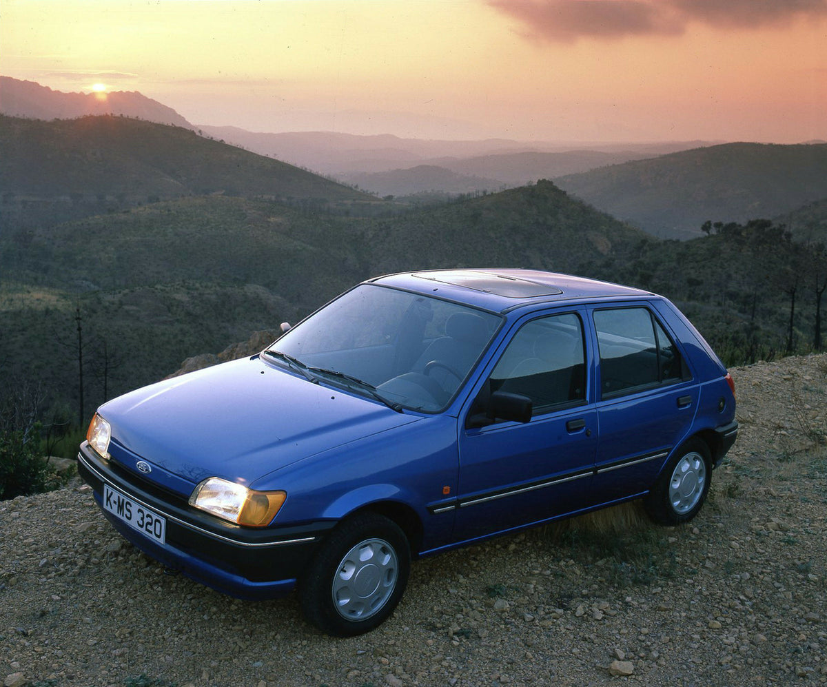 This archival image documents the 1989 Ford Fiesta Mark III LHD with scenic mountains and is preserved in the Ford Heritage Vault as part of Ford Motor Company's historic photographic archive. Free for personal, non-commercial use. Ford Heritage V...
