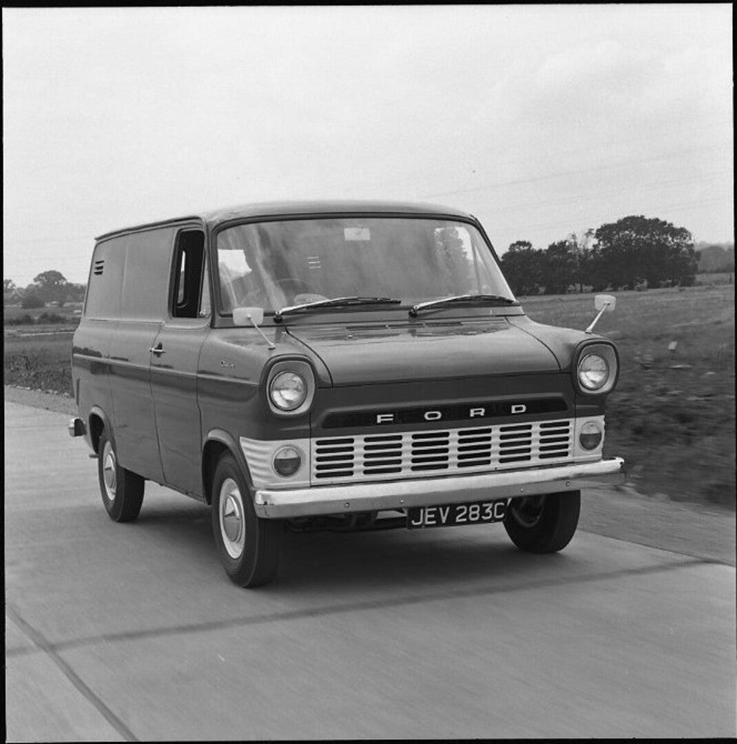 This archival image documents the 1965 Ford Transit Mark I action shot on scenic road and is preserved in the Ford Heritage Vault as part of Ford Motor Company's historic photographic archive. Free for personal, non-commercial use. Ford Heritage V...