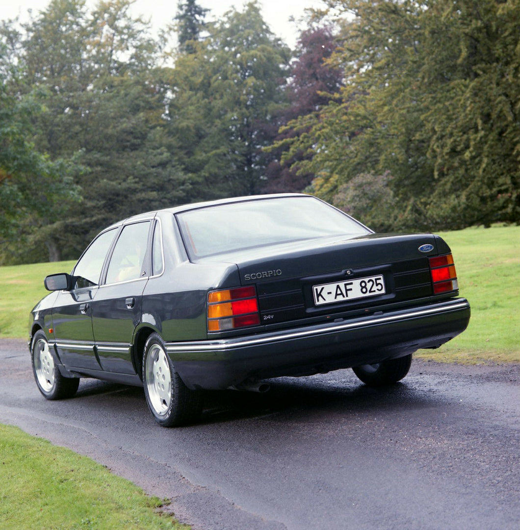 This archival image documents the 1990 Ford Scorpio Cosworth 24 Valve Mark I on scenic road and is preserved in the Ford Heritage Vault as part of Ford Motor Company's historic photographic archive. Free for personal, non-commercial use. Ford Heri...