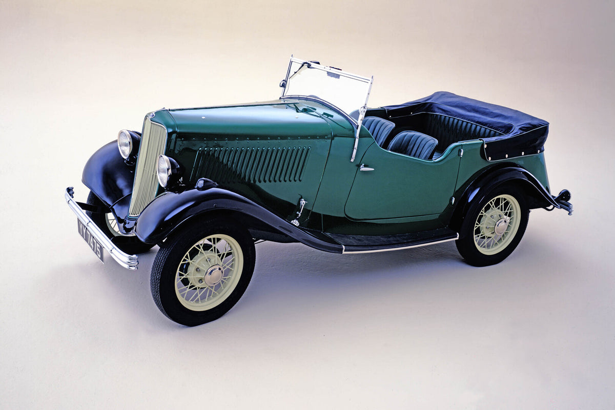 This archival image documents the 1932 Ford Model Y 2-door saloon in studio and is preserved in the Ford Heritage Vault as part of Ford Motor Company's historic photographic archive. Free for personal, non-commercial use. Ford Heritage Vault refer...