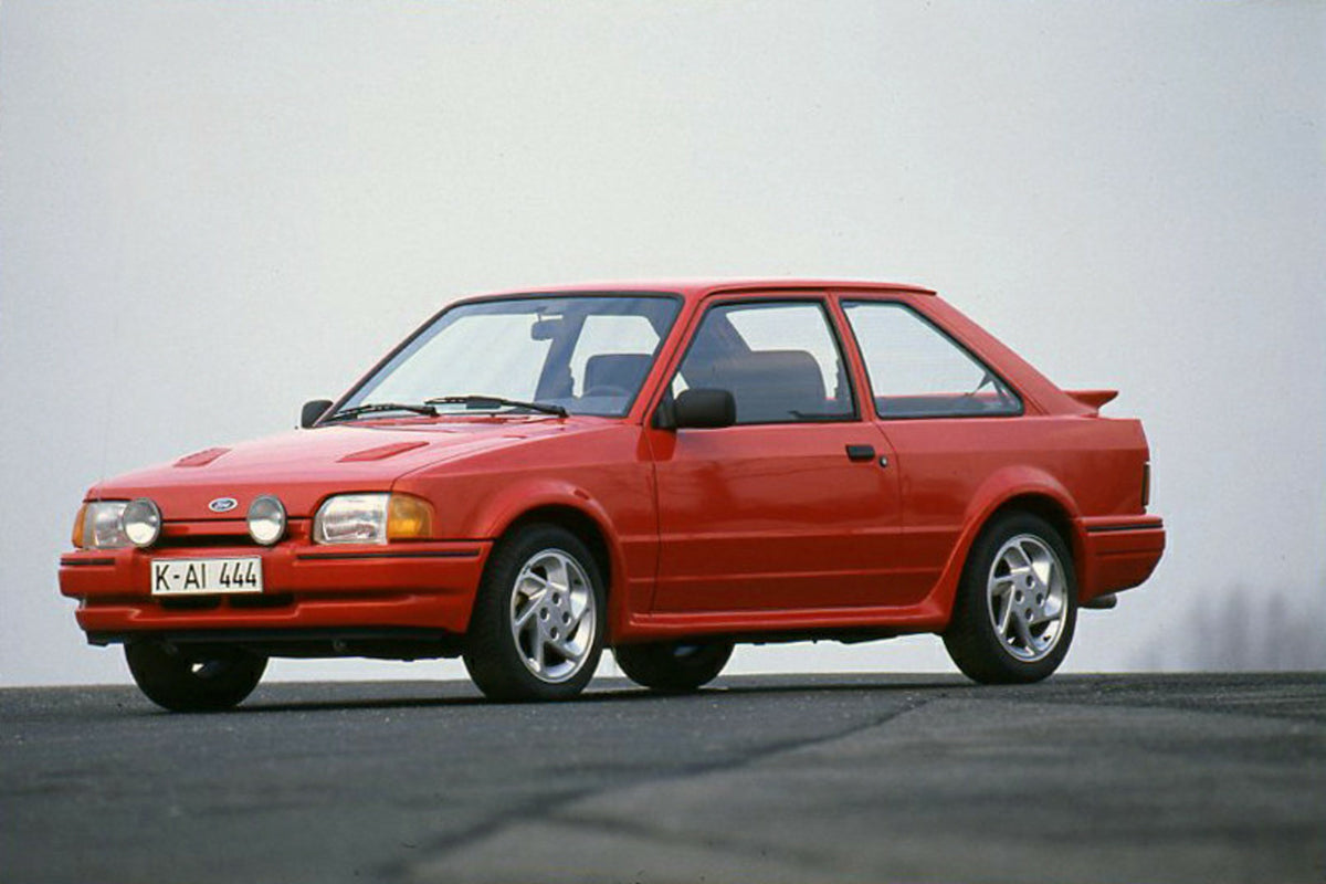 This archival image documents the 1986 Ford Escort Mark IV Turbo LHD closeup on road and is preserved in the Ford Heritage Vault as part of Ford Motor Company's historic photographic archive. Free for personal, non-commercial use. Ford Heritage Va...