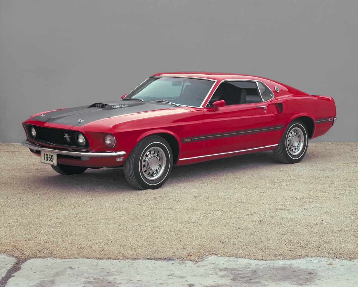 This archival image documents the 1969 Ford Mustang Mach 1 fastback and is preserved in the Ford Heritage Vault as part of Ford Motor Company's historic photographic archive. Free for personal, non-commercial use. Ford Heritage Vault reference AR-...