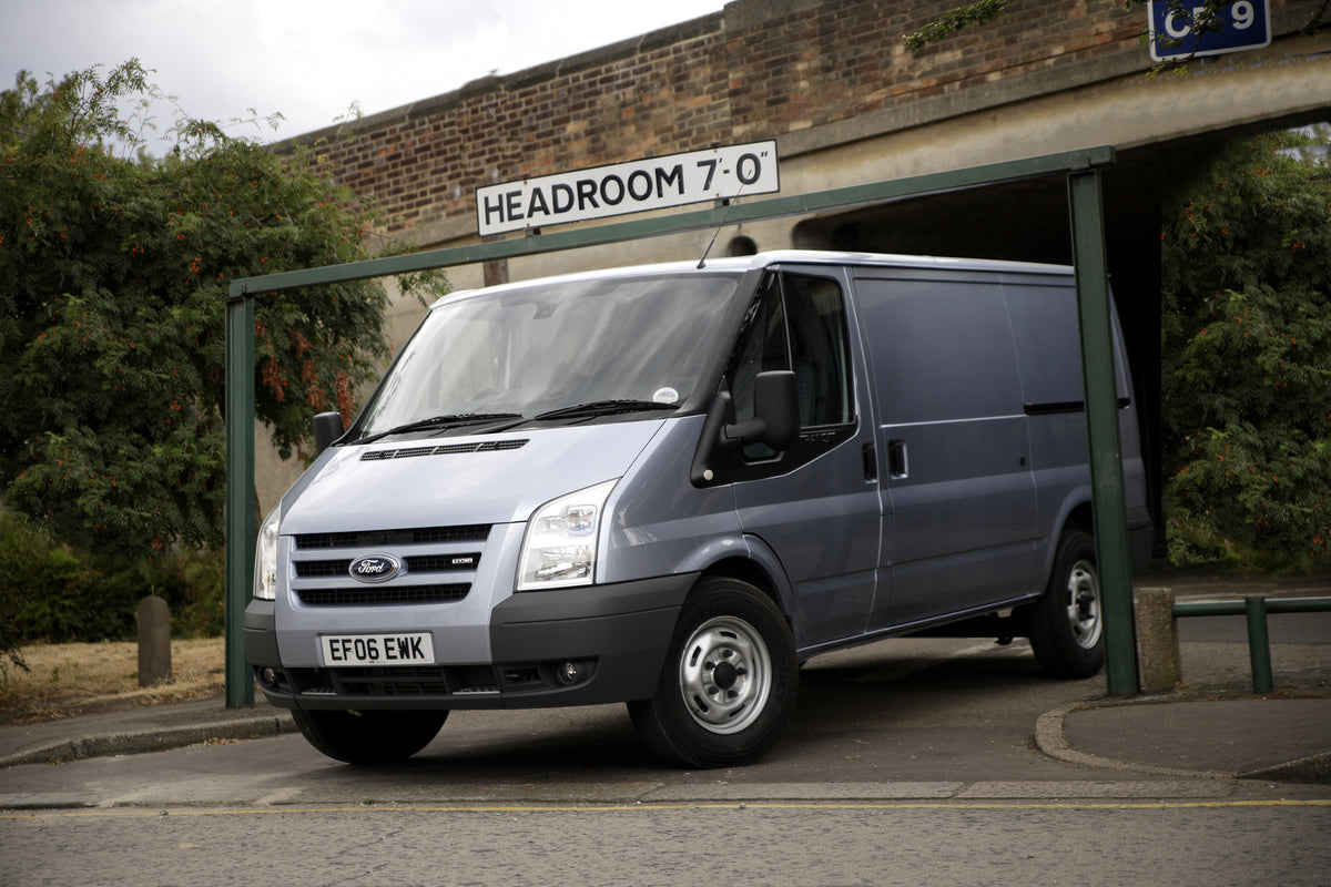 This archival image documents the 2006 Ford Transit Mark IV driving under barrier and is preserved in the Ford Heritage Vault as part of Ford Motor Company's historic photographic archive. Free for personal, non-commercial use. Ford Heritage Vault...