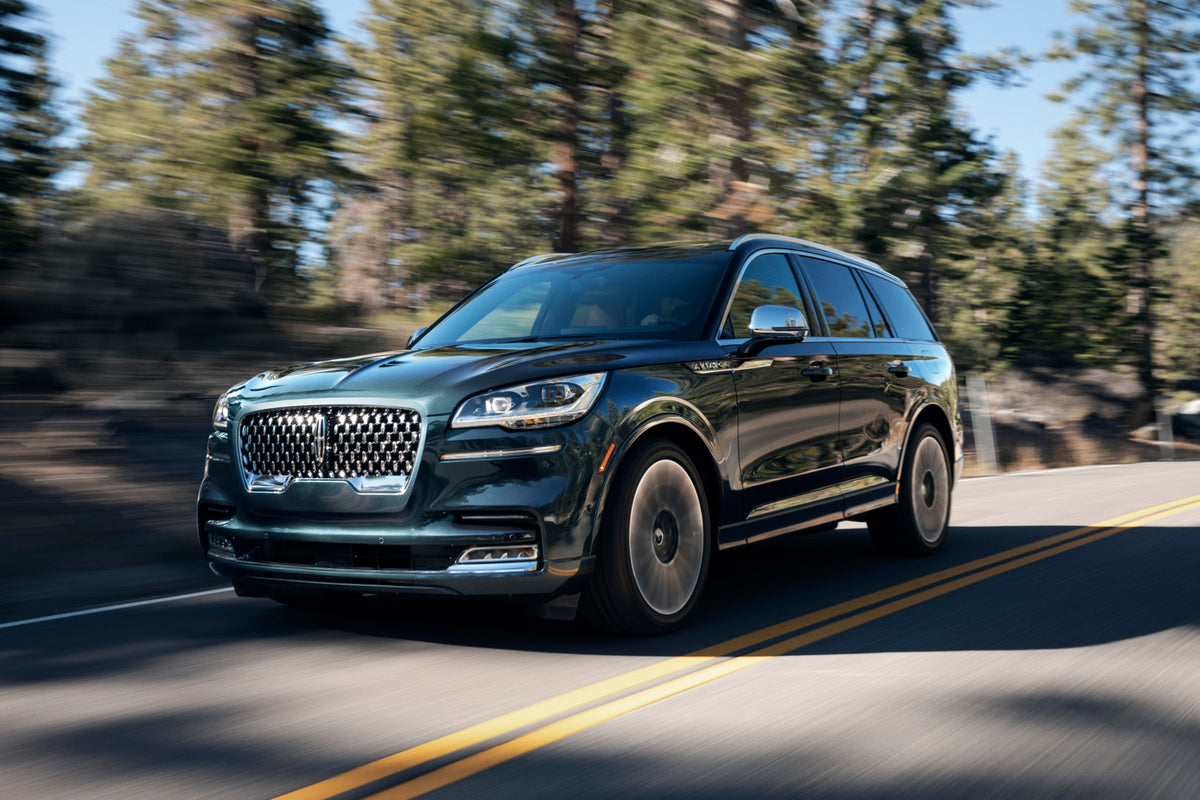 This archival image documents the 2020 Lincoln Aviator Black Label action shot on scenic road and is preserved in the Ford Heritage Vault as part of Ford Motor Company's historic photographic archive. Free for personal, non-commercial use. Ford He...