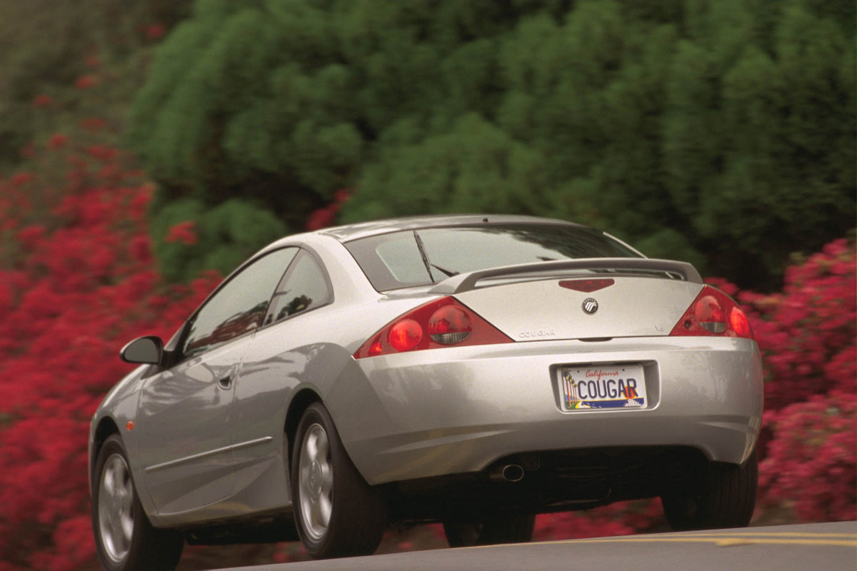 This archival image documents the 2000 Mercury Cougar Rear View and is preserved in the Ford Heritage Vault as part of Ford Motor Company's historic photographic archive. Free for personal, non-commercial use. Ford Heritage Vault reference AR-2008...