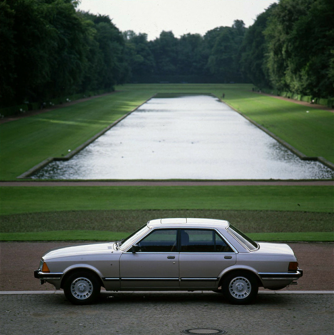 This archival image documents the 1981 Ford Granada 2.8 Ghia Mark II in front of scenic pond and is preserved in the Ford Heritage Vault as part of Ford Motor Company's historic photographic archive. Free for personal, non-commercial use. Ford Her...