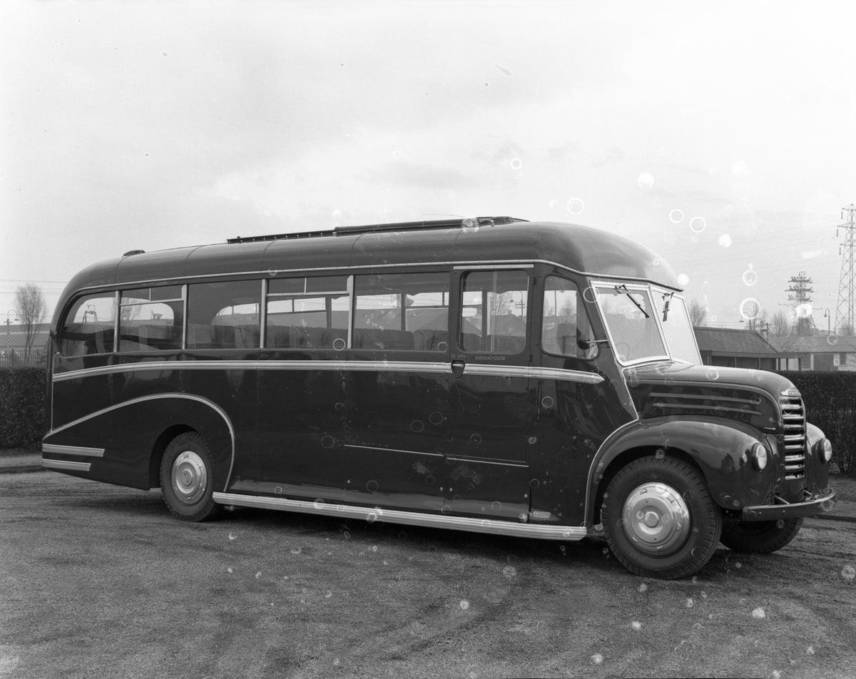 This archival image documents the 1952 Fordson Thames ET6 coach at sports club and is preserved in the Ford Heritage Vault as part of Ford Motor Company's historic photographic archive. Free for personal, non-commercial use. Ford Heritage Vault re...