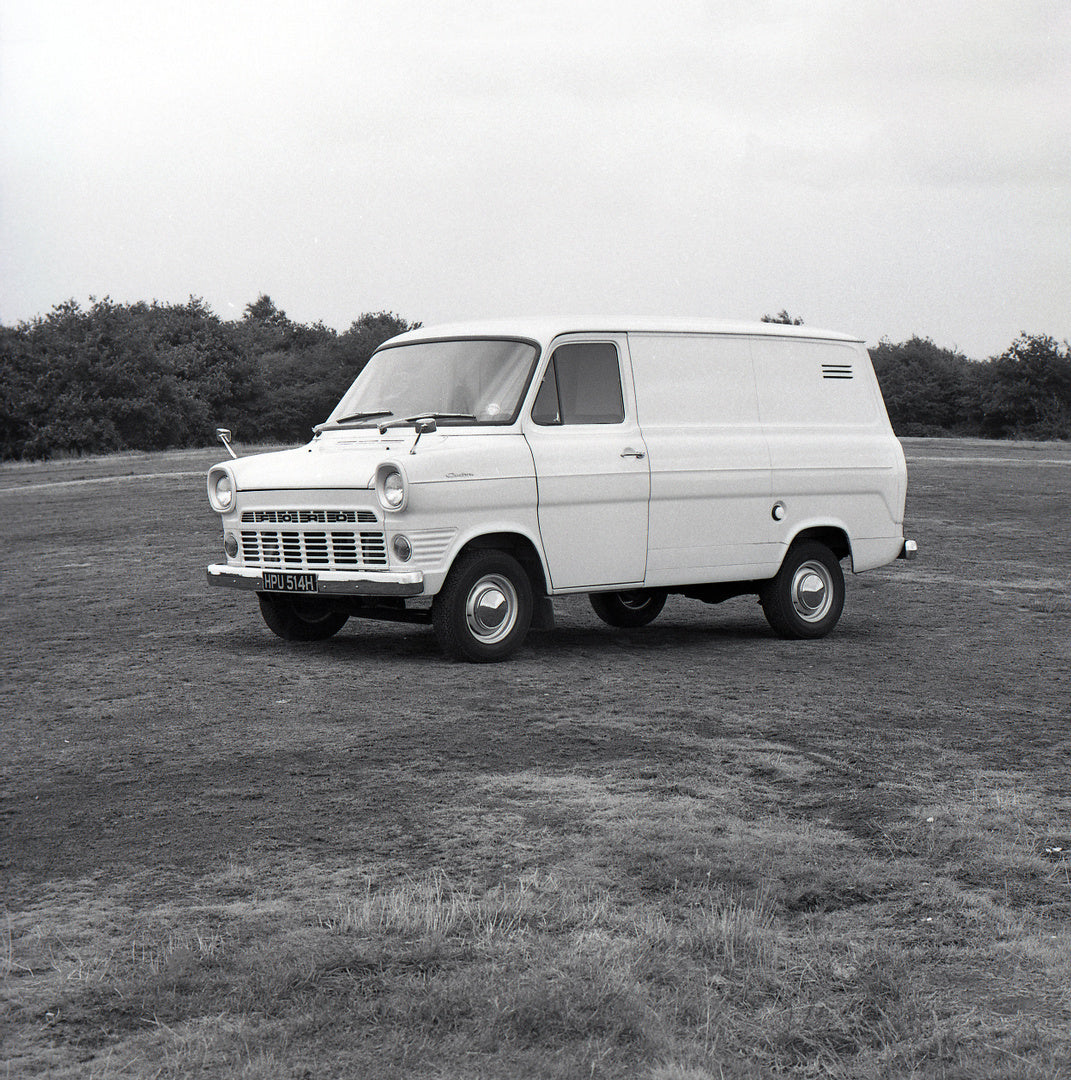 This archival image documents the 1970 Ford Transit Mark I Short Wheelbase Van in scenic field and is preserved in the Ford Heritage Vault as part of Ford Motor Company's historic photographic archive. Free for personal, non-commercial use. Ford H...