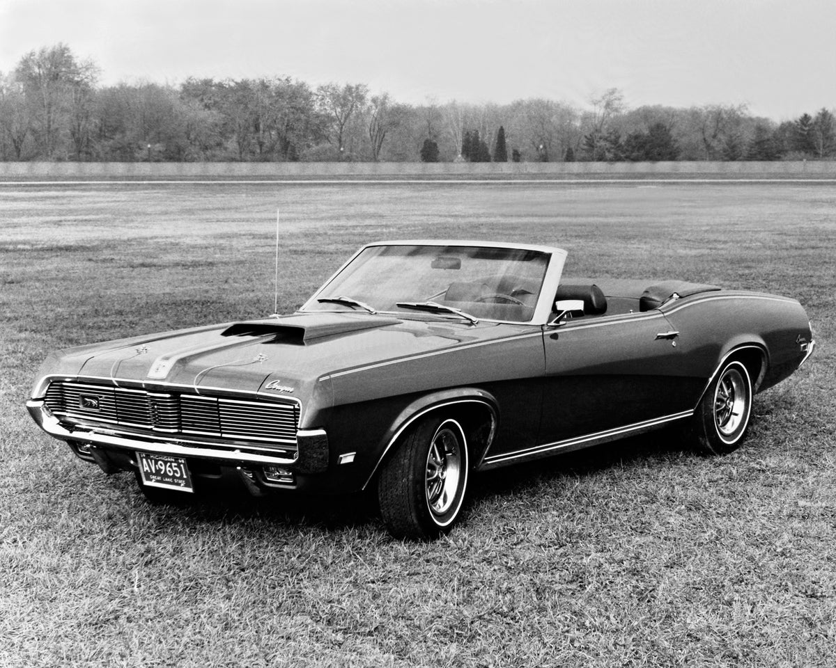 This archival image documents the 1969 Mercury Cougar convertible with Top Down and is preserved in the Ford Heritage Vault as part of Ford Motor Company's historic photographic archive. Free for personal, non-commercial use. Ford Heritage Vault r...
