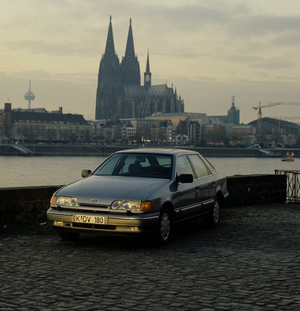 This archival image documents the 1985 Ford Scorpio Mark I with Cologne Cathedral in distance and is preserved in the Ford Heritage Vault as part of Ford Motor Company's historic photographic archive. Free for personal, non-commercial use. Ford He...
