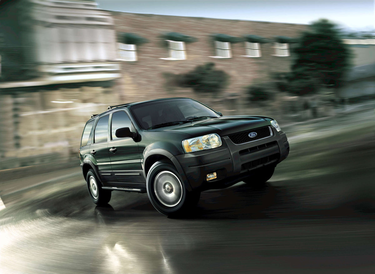 This archival image documents the 2003 Ford Escape and is preserved in the Ford Heritage Vault as part of Ford Motor Company's historic photographic archive. Free for personal, non-commercial use. Ford Heritage Vault reference AR-2008-8.1.2.7310.