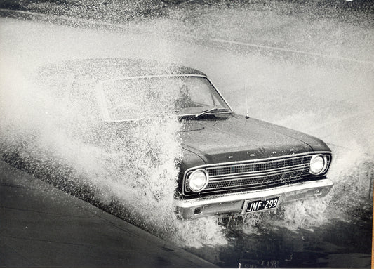 1966 Ford XR Falcon Sedan closeup action shot through puddle HV 1966-0148