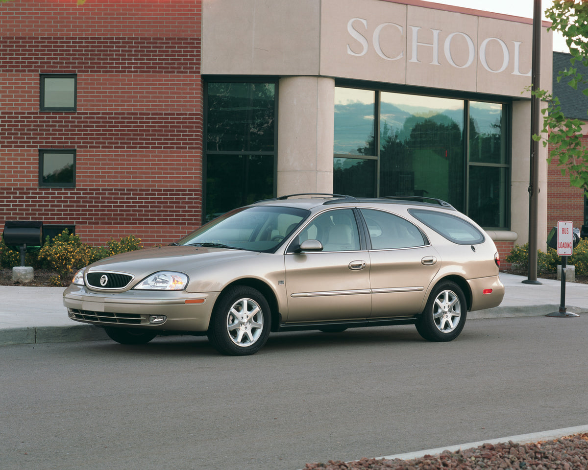 This archival image documents the 2001 Mercury Sable station wagon in Front of School Entrance and is preserved in the Ford Heritage Vault as part of Ford Motor Company's historic photographic archive. Free for personal, non-commercial use. Ford H...