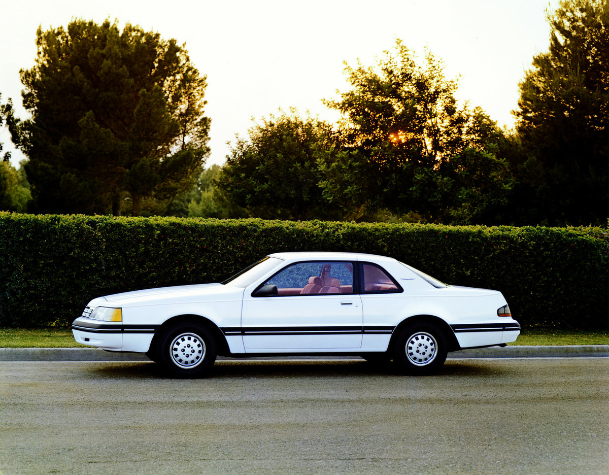 This archival image documents the 1987 Ford Thunderbird two-door and is preserved in the Ford Heritage Vault as part of Ford Motor Company's historic photographic archive. Free for personal, non-commercial use. Ford Heritage Vault reference AR-200...