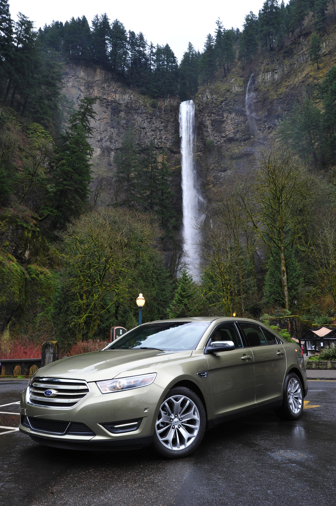 This archival image documents the 2013 Ford Taurus with scenic waterfall and is preserved in the Ford Heritage Vault as part of Ford Motor Company's historic photographic archive. Free for personal, non-commercial use. Ford Heritage Vault referenc...