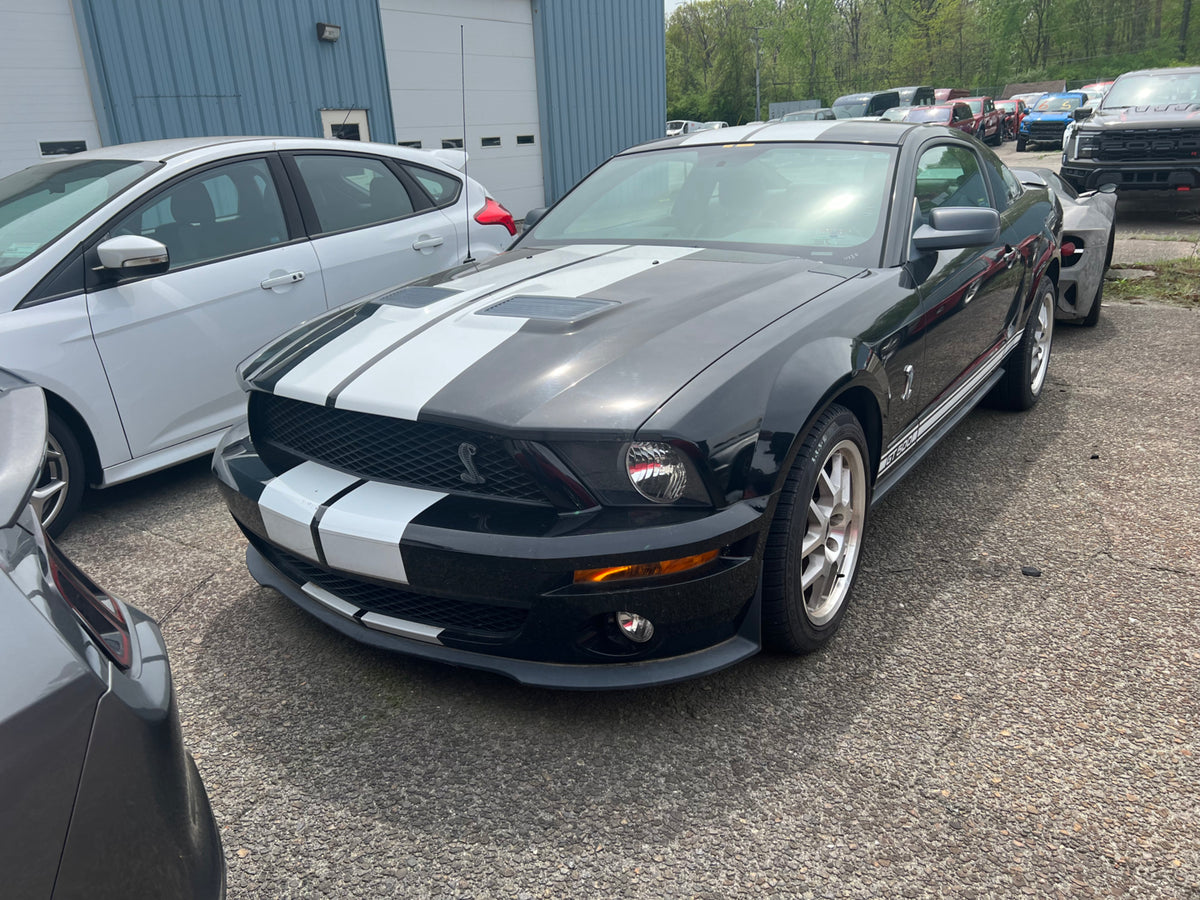 This archival image documents the 2008 Ford Mustang Shelby GT500 and is preserved in the Ford Heritage Vault as part of Ford Motor Company's historic photographic archive. Free for personal, non-commercial use. Ford Heritage Vault reference AR-202...
