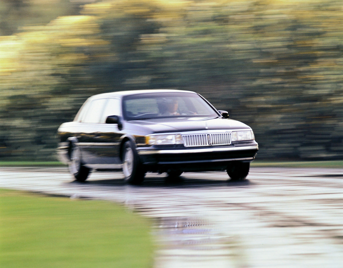 This archival image documents the 1992 Lincoln Continental four-door and is preserved in the Ford Heritage Vault as part of Ford Motor Company's historic photographic archive. Free for personal, non-commercial use. Ford Heritage Vault reference AR...