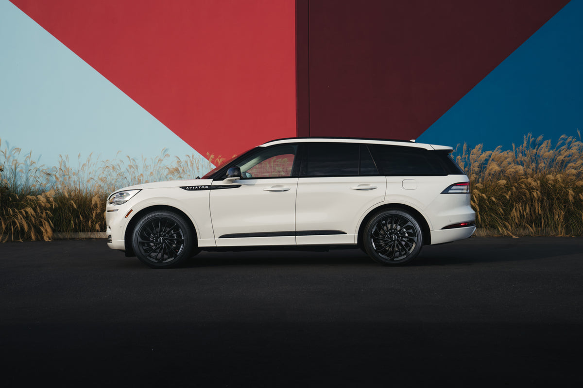 This archival image documents the 2022 Lincoln Aviator Jet Package side view with scenic background and is preserved in the Ford Heritage Vault as part of Ford Motor Company's historic photographic archive. Free for personal, non-commercial use. F...