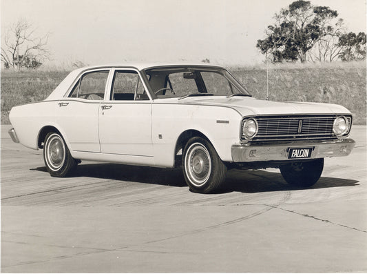 1968 Ford XT Falcon 500 on pavement with scenic trees HV 1968-0105