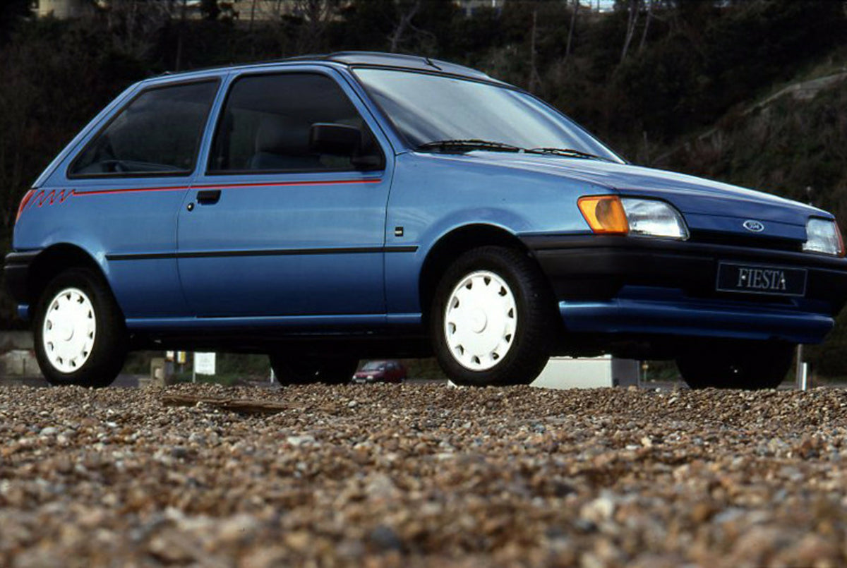 This archival image documents the 1990 Ford Fiesta Calypso LHD on beach and is preserved in the Ford Heritage Vault as part of Ford Motor Company's historic photographic archive. Free for personal, non-commercial use. Ford Heritage Vault reference...