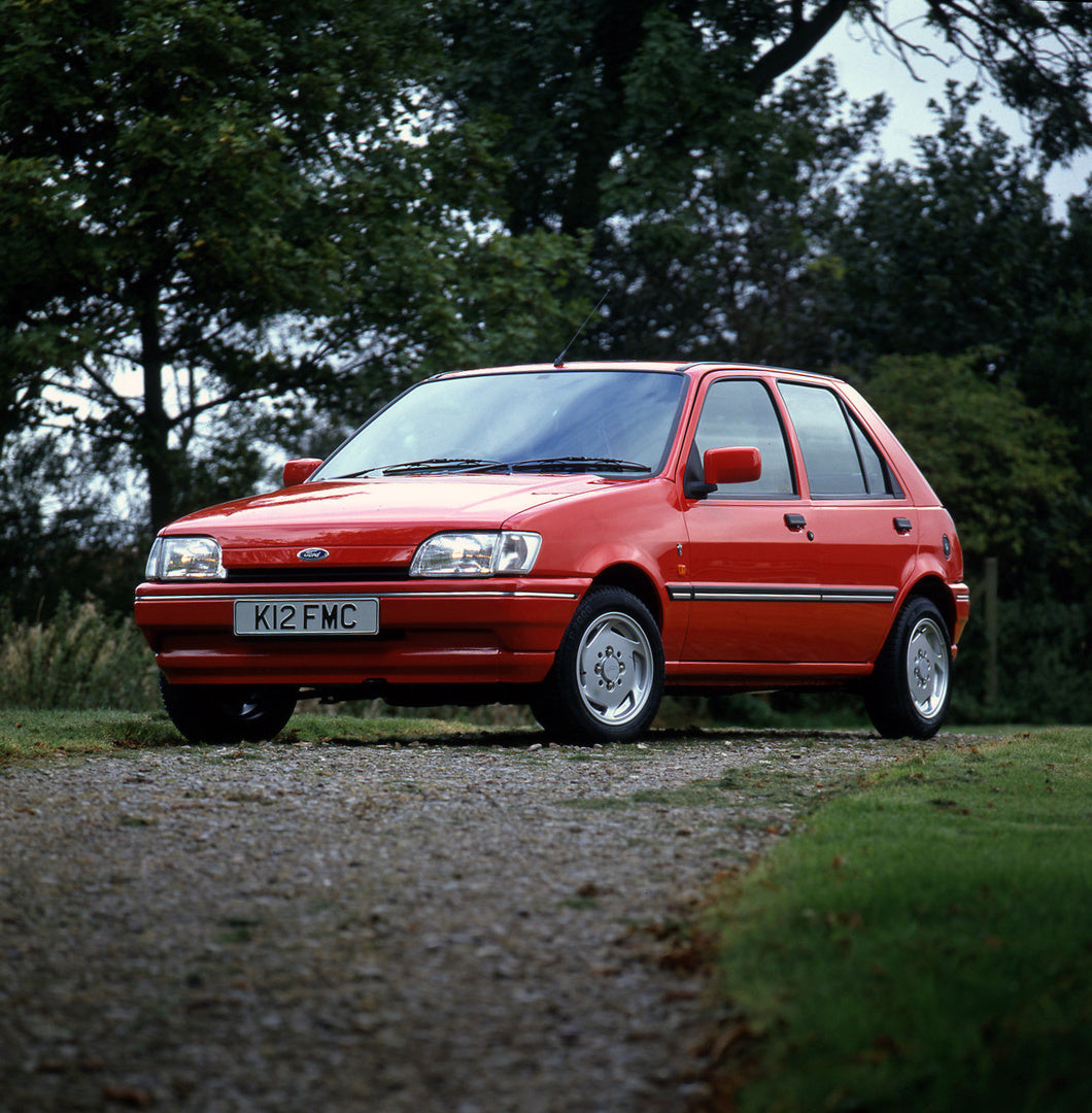 This archival image documents the 1992 Ford Fiesta Mark III Ghia on scenic forest road and is preserved in the Ford Heritage Vault as part of Ford Motor Company's historic photographic archive. Free for personal, non-commercial use. Ford Heritage ...