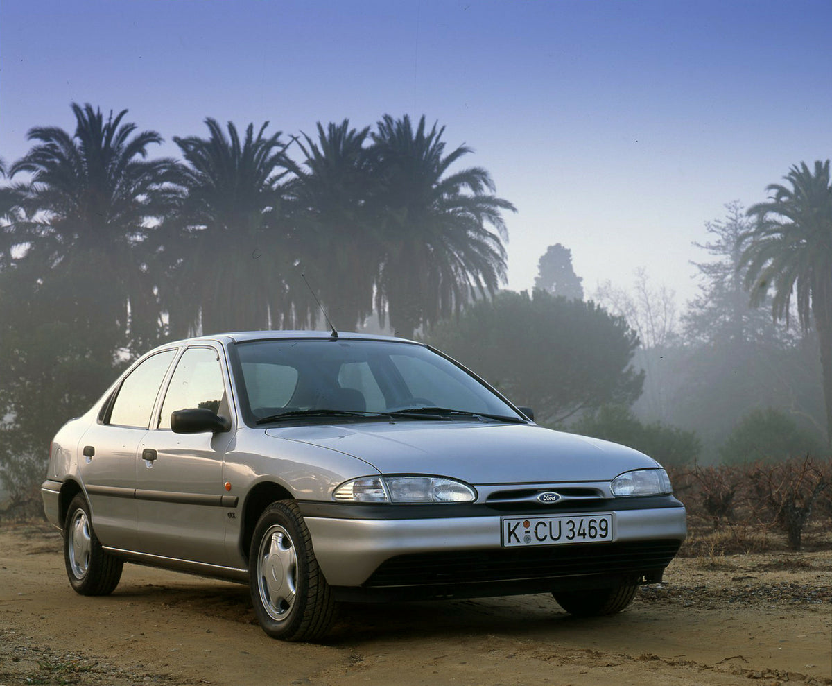 This archival image documents the 1993 Ford Mondeo Mark I on scenic dirt road with palm trees in Nice and is preserved in the Ford Heritage Vault as part of Ford Motor Company's historic photographic archive. Free for personal, non-commercial use....