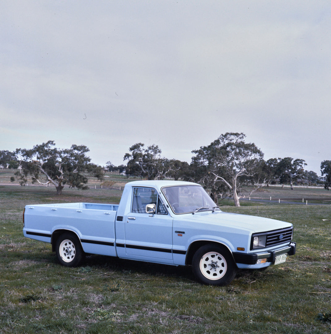 This archival image documents the 1984 Ford Courier XLT Pickup Truck Driver Side Front End View in the Park FAP-2011-3 and is preserved in the Ford Heritage Vault as part of Ford Motor Company's historic photographic archive. Free for personal, no...