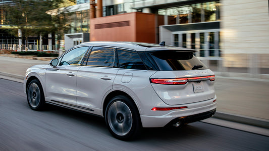 2021 Lincoln Corsair Grand Touring action shot on city road HV 2021-0022
