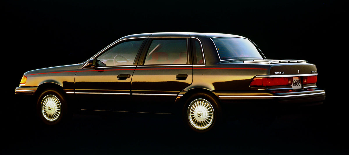 This archival image documents the 1988 Mercury Topaz LS four-door and is preserved in the Ford Heritage Vault as part of Ford Motor Company's historic photographic archive. Free for personal, non-commercial use. Ford Heritage Vault reference AR-20...