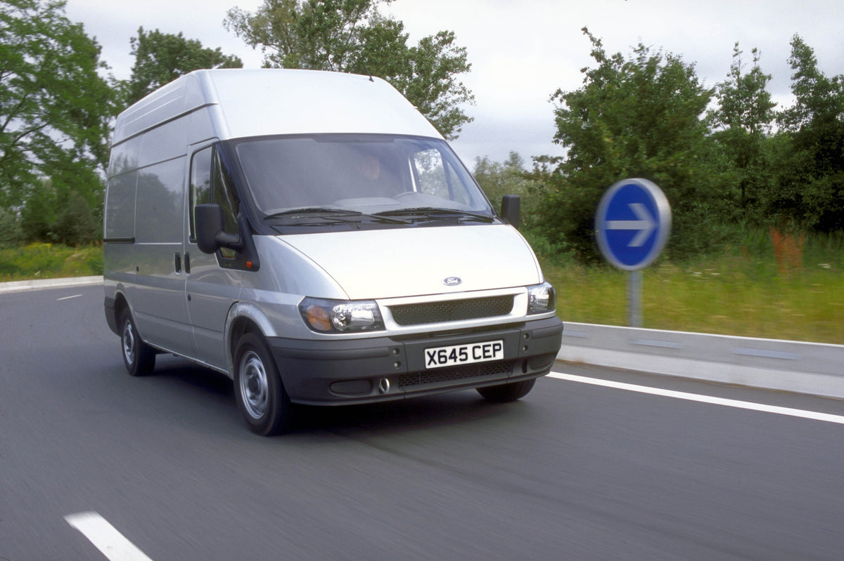 This archival image documents the 2001 Ford Transit MK III in motion and is preserved in the Ford Heritage Vault as part of Ford Motor Company's historic photographic archive. Free for personal, non-commercial use. Ford Heritage Vault reference AR...