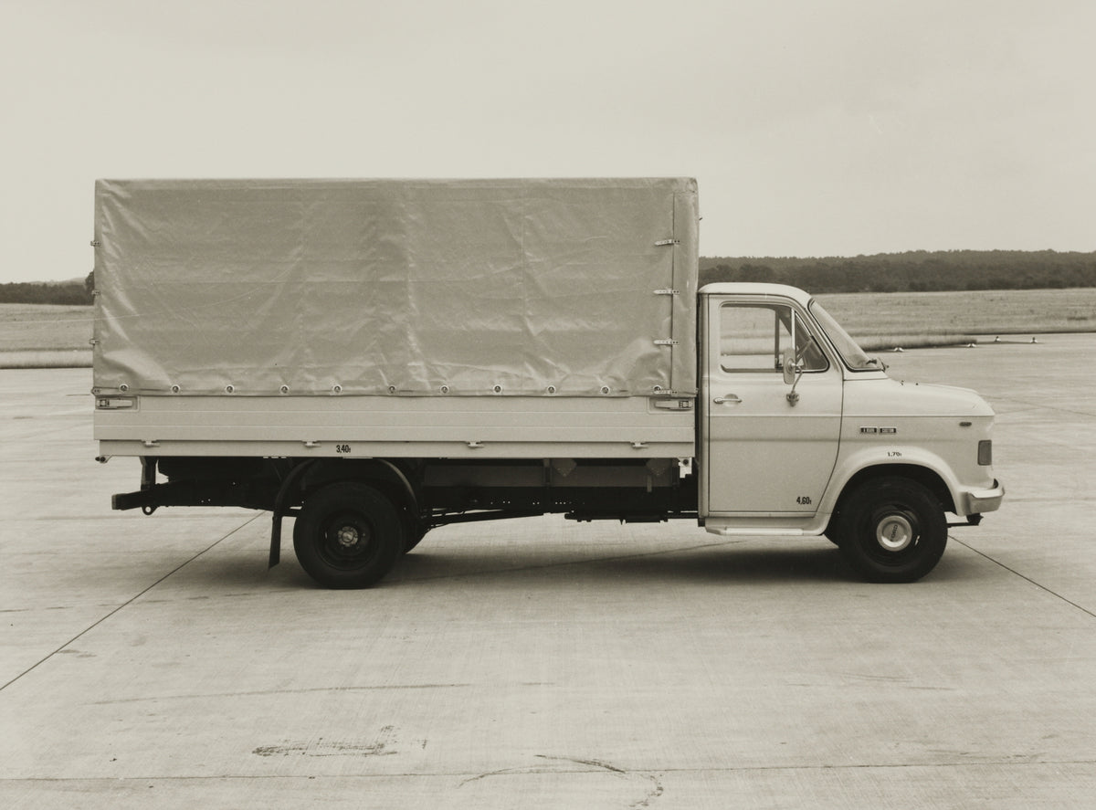 This archival image documents the 1970 Ford A-Series Truck side view on pavement and is preserved in the Ford Heritage Vault as part of Ford Motor Company's historic photographic archive. Free for personal, non-commercial use. Ford Heritage Vault ...