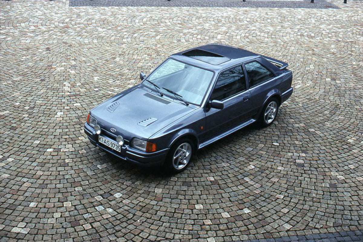 This archival image documents the 1989 Heritage Archive - 1988 Ford Escort Mark IV on mosaic brick and is preserved in the Ford Heritage Vault as part of Ford Motor Company's historic photographic archive. Free for personal, non-commercial use. Fo...