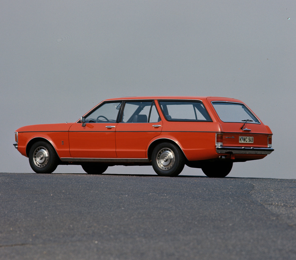 This archival image documents the 1975 Ford Granada Mark I GL rear view with scenic blue sky and is preserved in the Ford Heritage Vault as part of Ford Motor Company's historic photographic archive. Free for personal, non-commercial use. Ford Her...