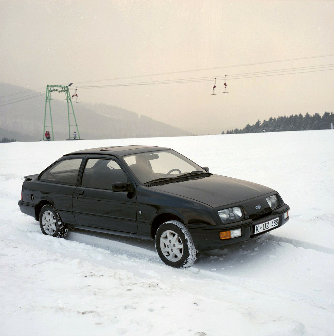 This archival image documents the 1985 Ford Sierra XR 4x4 LHD in snow and is preserved in the Ford Heritage Vault as part of Ford Motor Company's historic photographic archive. Free for personal, non-commercial use. Ford Heritage Vault reference A...