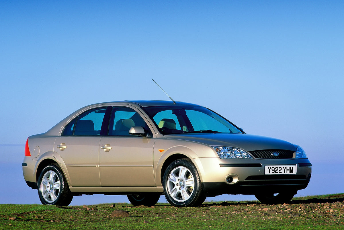 This archival image documents the 2001 Ford Mondeo Mark II with scenic blue sky and is preserved in the Ford Heritage Vault as part of Ford Motor Company's historic photographic archive. Free for personal, non-commercial use. Ford Heritage Vault r...