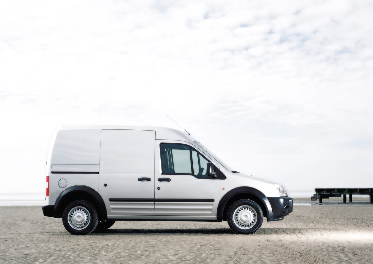 This archival image documents the 2002 Ford Transit Connect side view on scenic beach and is preserved in the Ford Heritage Vault as part of Ford Motor Company's historic photographic archive. Free for personal, non-commercial use. Ford Heritage V...