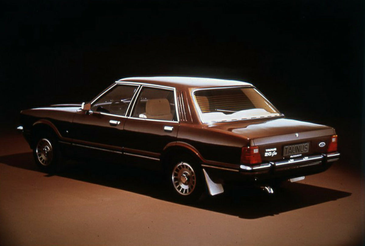 This archival image documents the 1976 Ford Taunus 2.0 Ghia rear view in studio and is preserved in the Ford Heritage Vault as part of Ford Motor Company's historic photographic archive. Free for personal, non-commercial use. Ford Heritage Vault r...