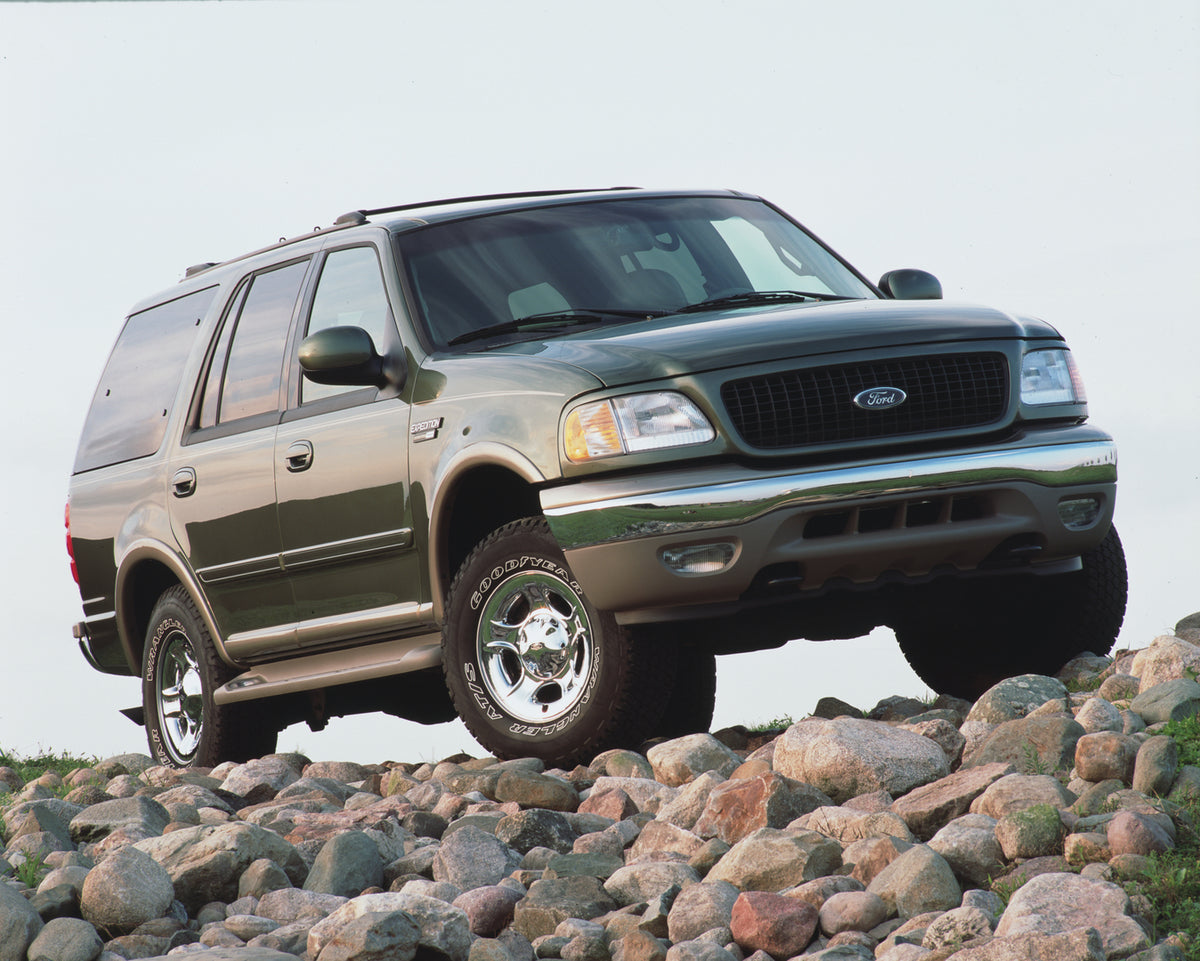 This archival image documents the 2002 Ford Expedition Eddie Bauer and is preserved in the Ford Heritage Vault as part of Ford Motor Company's historic photographic archive. Free for personal, non-commercial use. Ford Heritage Vault reference AR-2...