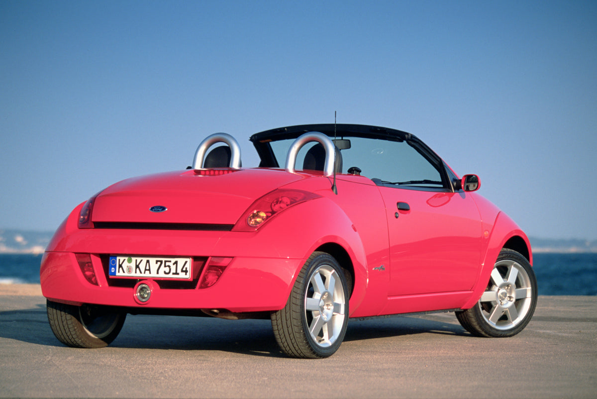 This archival image documents the 2003 Ford Ka Mark I rear view on scenic beach in Cannes and is preserved in the Ford Heritage Vault as part of Ford Motor Company's historic photographic archive. Free for personal, non-commercial use. Ford Herita...