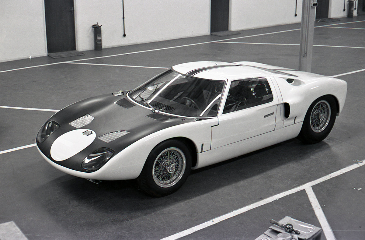 This archival image documents the 1964 Ford GT in garage and is preserved in the Ford Heritage Vault as part of Ford Motor Company's historic photographic archive. Free for personal, non-commercial use. Ford Heritage Vault reference AR-2000-213654...