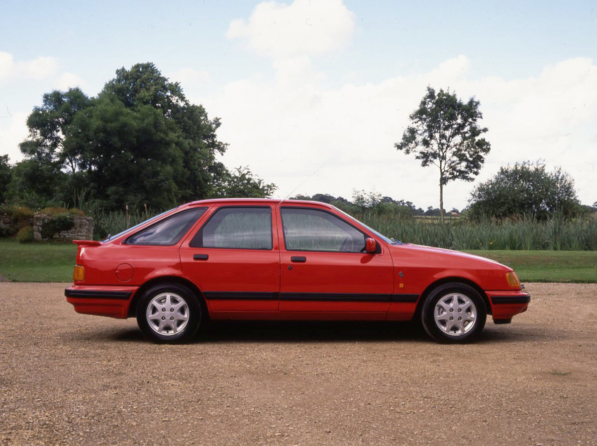 This archival image documents the 1988 Ford Sierra Mark II side view with scenic trees and is preserved in the Ford Heritage Vault as part of Ford Motor Company's historic photographic archive. Free for personal, non-commercial use. Ford Heritage ...