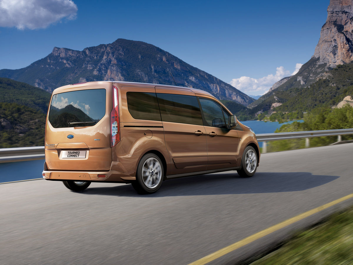 This archival image documents the 2015 Ford Transit Connect action shot scenic mountain road and is preserved in the Ford Heritage Vault as part of Ford Motor Company's historic photographic archive. Free for personal, non-commercial use. Ford Her...