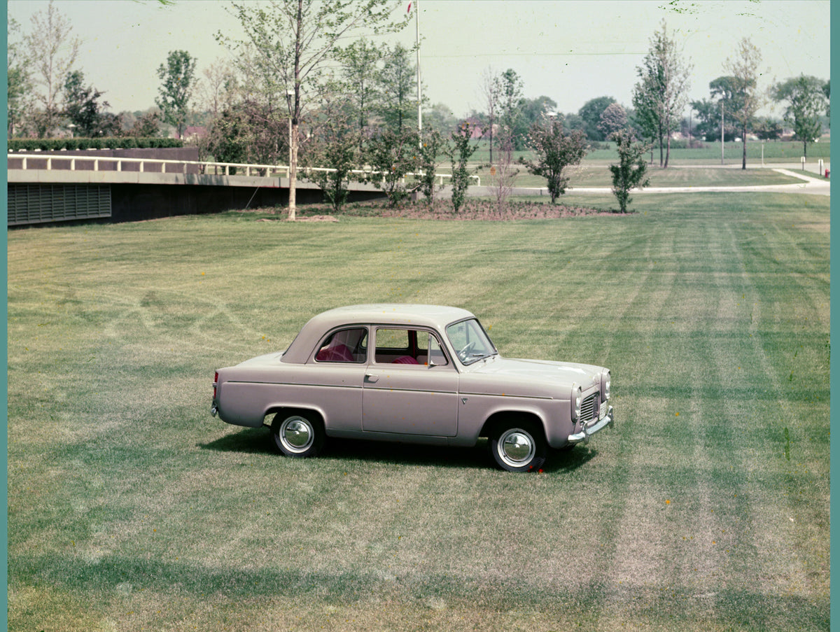 This archival image documents the 1958 Ford Anglia 100E scenic and is preserved in the Ford Heritage Vault as part of Ford Motor Company's historic photographic archive. Free for personal, non-commercial use. Ford Heritage Vault reference AR-2008-...